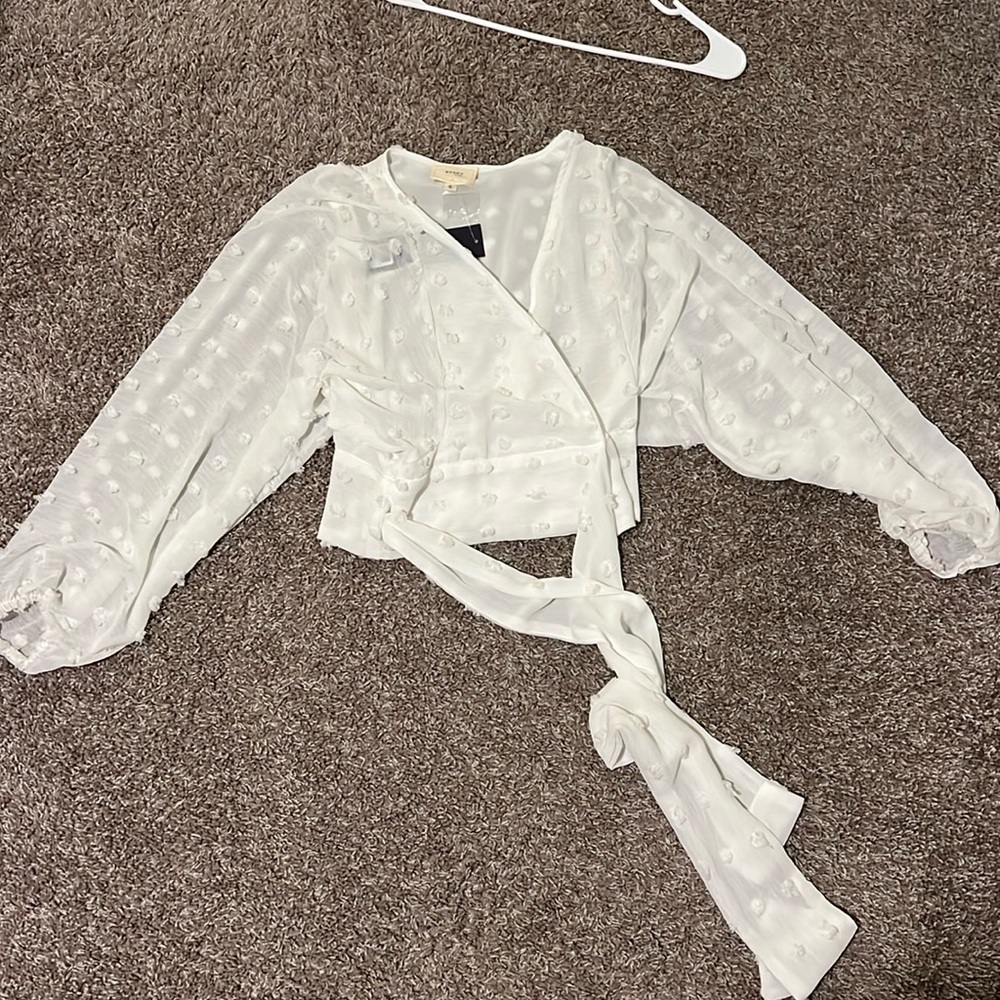 White patterned wrap blouse